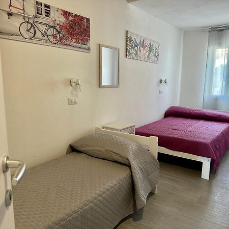 Approdo Apartments Isola Rossa Bagian luar foto